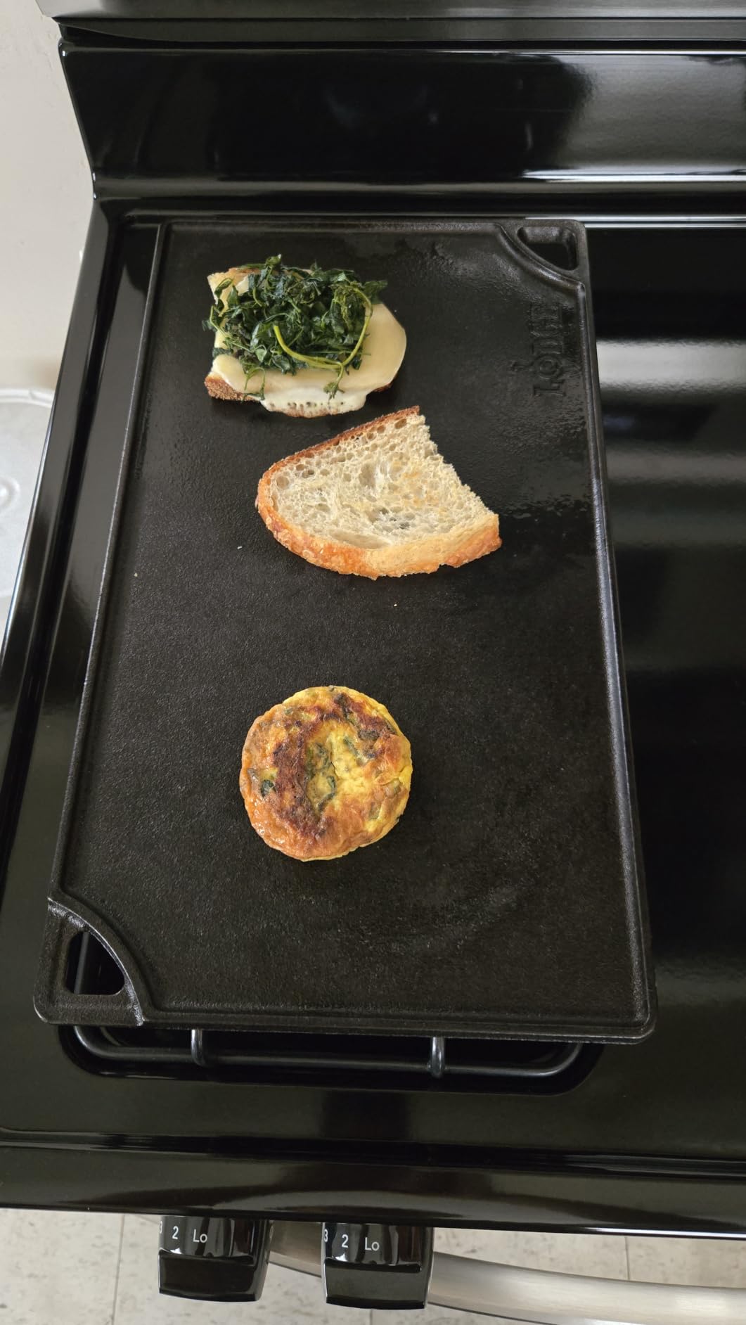 Lodge Reversible Cast Iron Grill/Griddle Pan 16.75 x 9.5 - Pre-Seasoned Dual-Sided Double Burner for BBQ, Eggs, Pancakes, Burgers - PFAS Free Cookware - Flat Top Plate for Oven, Grill, & Campfire customer photo 1