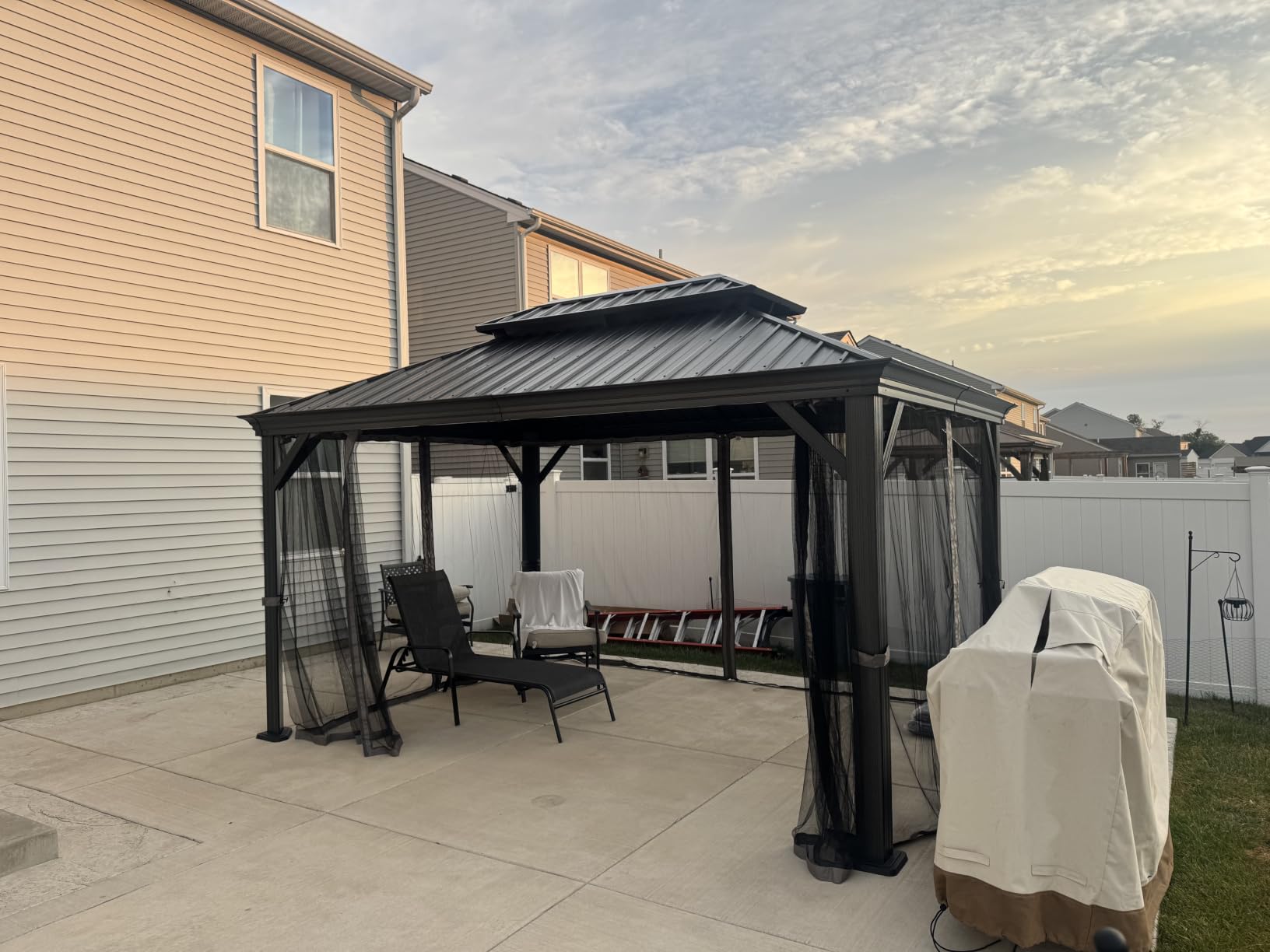 Kozyard Alexander Hardtop Aluminum Permanent Gazebo with a Mosquito Net and Privacy Sidewalls (Alexander 12'x14' (Brown) customer photo 2