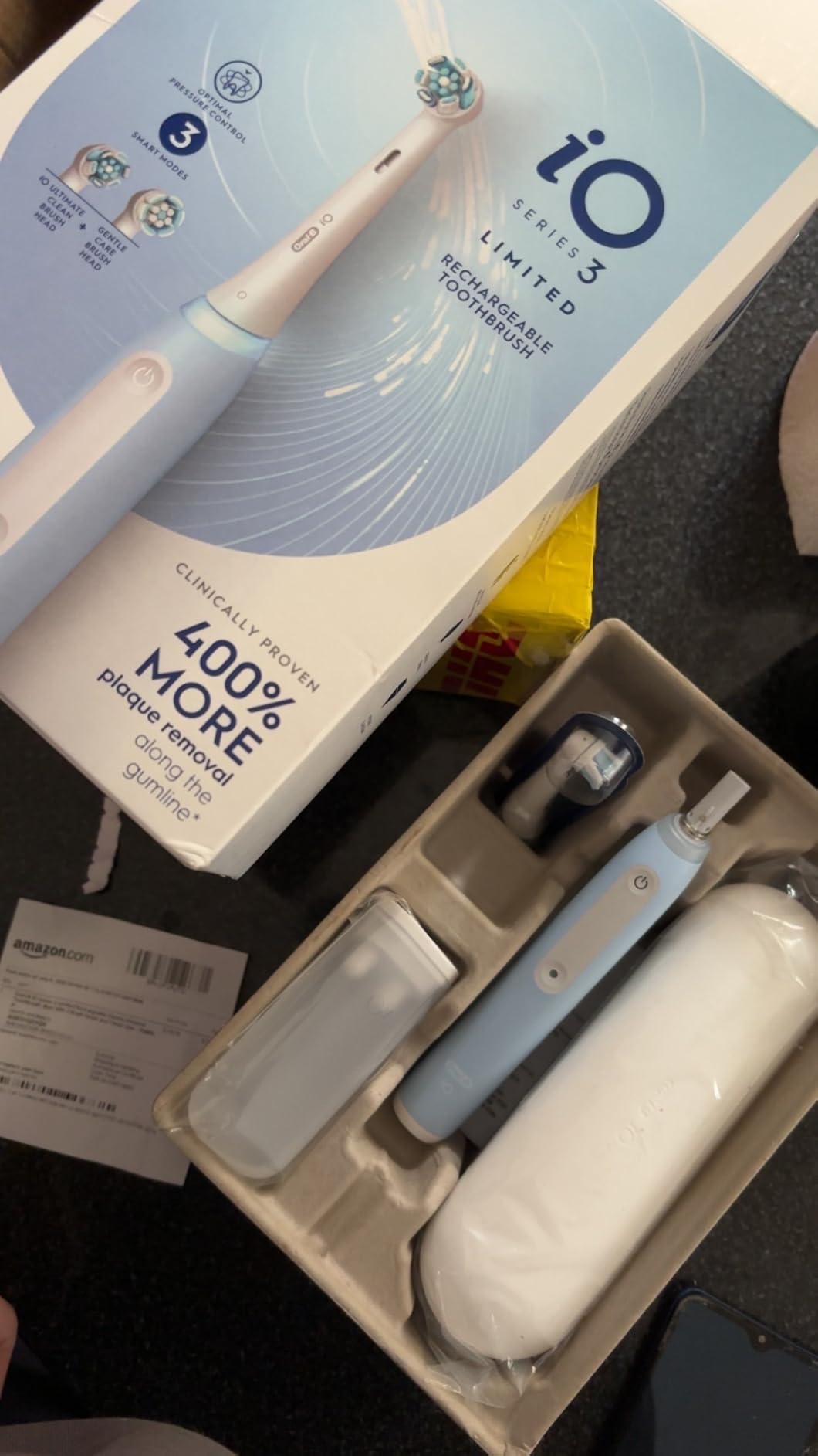 Oral-B Rechargeable Electric Toothbrush, iO3 Limited Deep Clean, 3 Cleaning Modes, Visual Pressure Sensor to Protect Gums, 2 Brush Heads, Travel Case, White customer photo 1