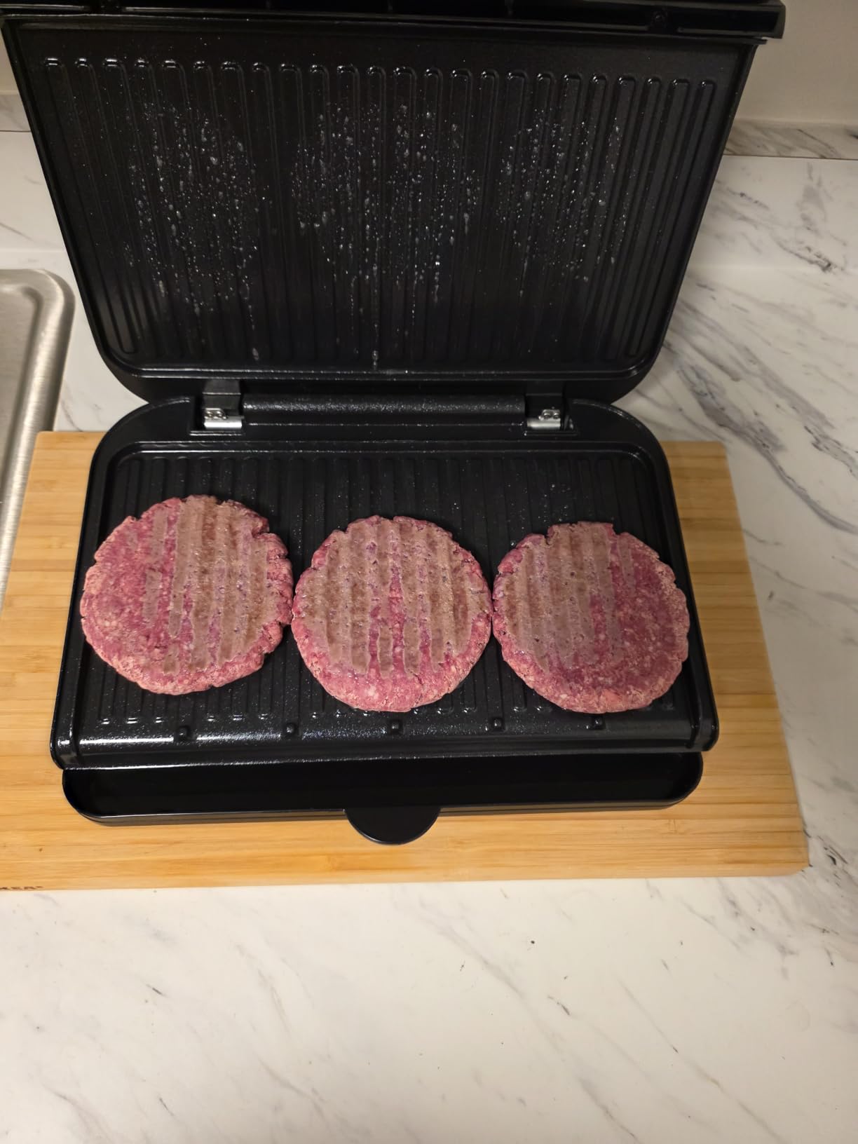 George Foreman Family-Size Grill & Panini Press, Nonstick Ceramic Coating, Fat-Removing Slope, Adjustable Angle, Indoor/Outdoor Use customer photo 2