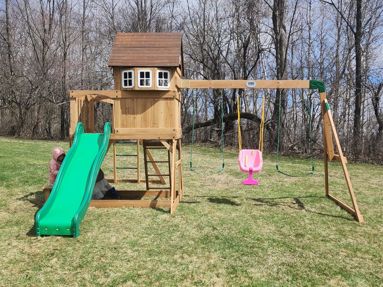 Backyard Discovery Montpelier Cedar Wood Swing Set, Wave Slide, Clubhouse, Monkey Bars, Picnic Area, Snack Bar, Belt Swings, Trapeze, Balcony, Playhouse, Working Door, Ladder, Outdoor Playset customer photo 1