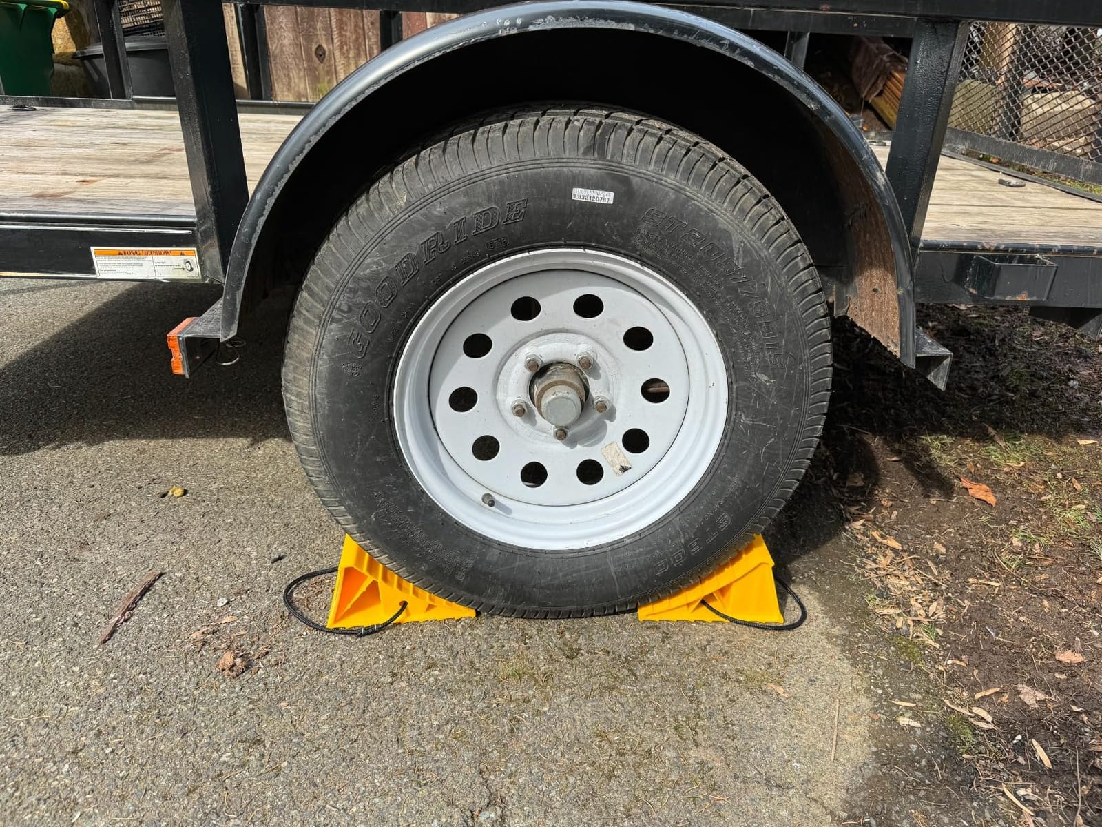 Camco RV Wheel Chocks with Rope - 2-Pack - Made in the USA | Keeps Trailer in-Place to Safely Unhitch - Compatible w/ Wheels Up to 26