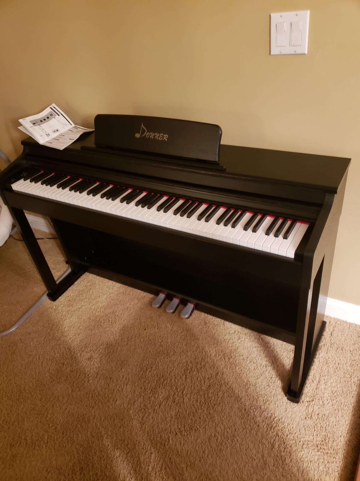 Donner DDP-100 88-Key Weighted Action Digital Piano for Beginner Bundle with Piano Keyboard Stand, Power Adapter, Triple Pedals, MP3 Function, USB-MIDI, 2 Headphone Jacks Black customer photo 1