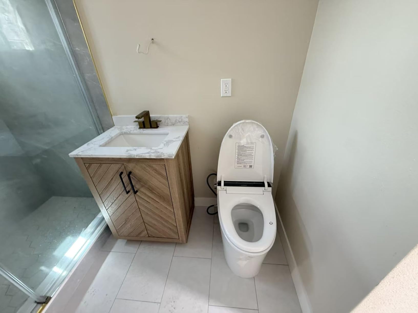 CANEST Smart Toilet with Bidet Built in, ADA Comfort Height, Intelligent Temp Control, Foot Sensor Operation, Warm Water, Heated Seat, Air Dryer, Digital Display (TC-100GE) customer photo 2