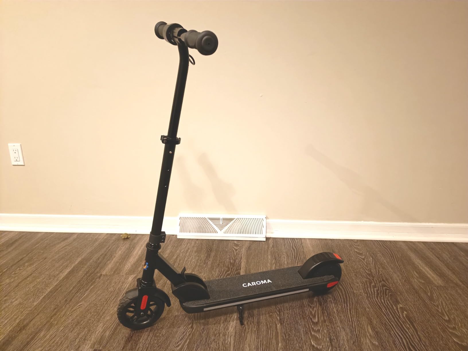 Caroma E35 Kids Electric Scooter for Ages 8-12, 150W Motor Up to 7 Miles Range & 10 MPH Speed, LED Display, Colorful Rainbow Lights, Adjustable Height, Foldable & Lightweight Design customer photo 1