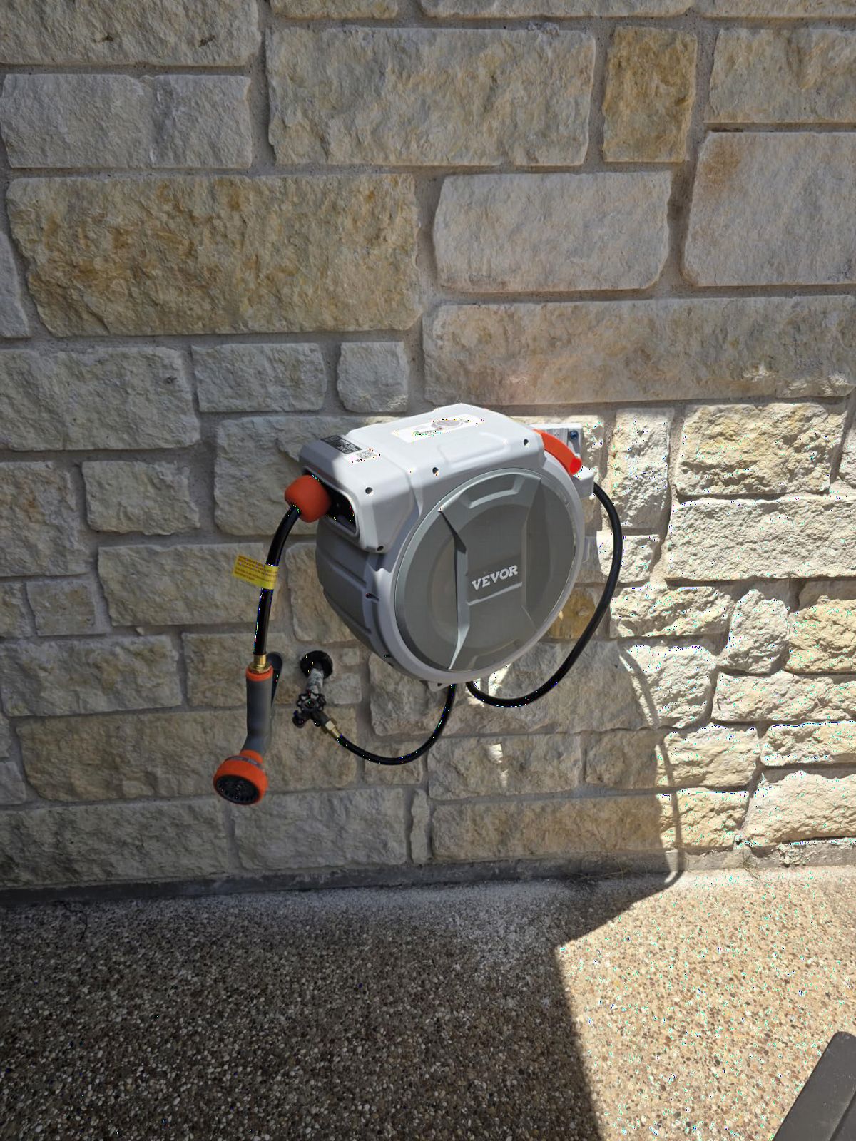 VEVOR Retractable Garden Hose Reel, 5/8 Inch x 100 ft Wall Mounted Hose Reel, Heavy Duty Garden Hose Reel with 9 Patterns Nozzle, Any Length Lock, Upgraded Slow Return System and 180°Swivel Bracket customer photo 1