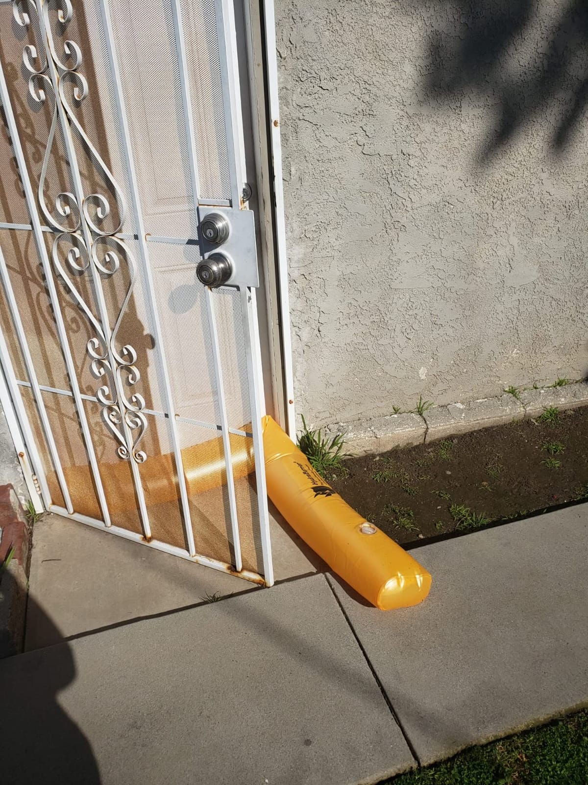 The Original HydraBarrier Standard Flood Barrier - 24 ft Long x 4 in High - Light, Reusable Sandbag Alternative - Flood Control & Diversion Tube for Home, Garage, Door & Property Protection customer photo 2