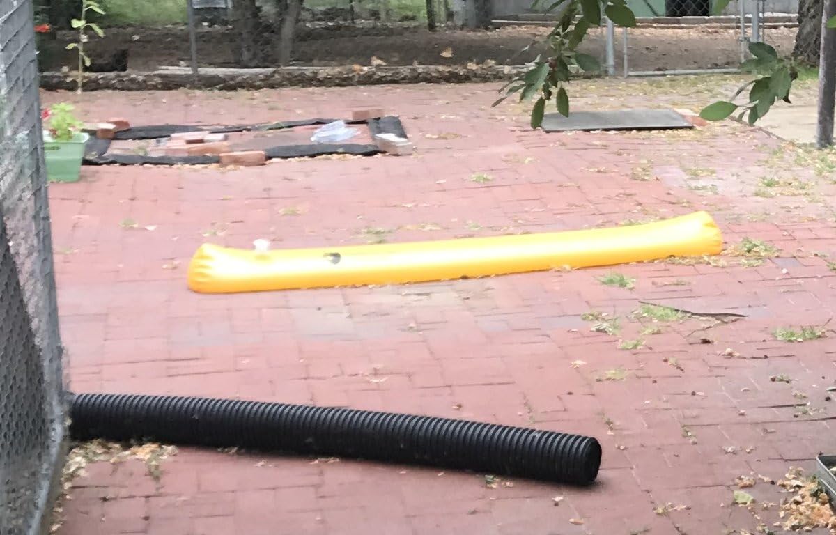 The Original HydraBarrier Ultra Flood Barrier - 12 ft Long x 6 in High - Light, Reusable Sandbag Alternative - Flood Control & Diversion Tube for Home, Garage, Door & Property Protection customer photo 1