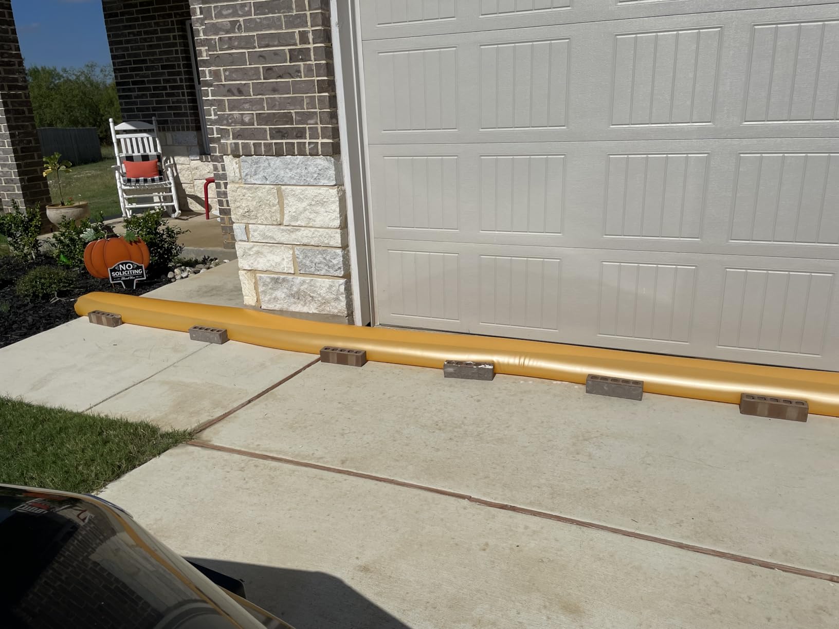 The Original HydraBarrier Ultra Flood Barrier - 12 ft Long x 6 in High - Light, Reusable Sandbag Alternative - Flood Control & Diversion Tube for Home, Garage, Door & Property Protection customer photo 2