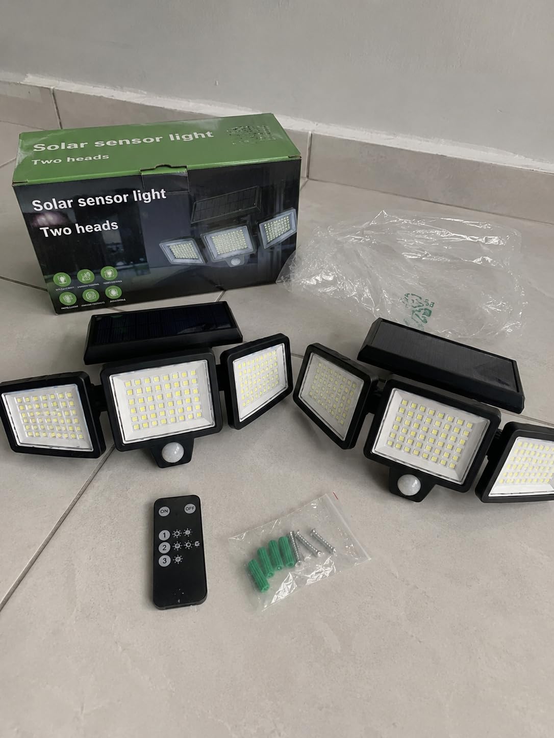 Tuffenough Solar Outdoor Lights 2500LM 210 LED Security Lights with Remote Control, 3 Heads Motion Sensor Lights, IP65 Waterproof, 270° Wide Angle Flood Wall Lights with 3 Modes (2 Packs) customer photo 1