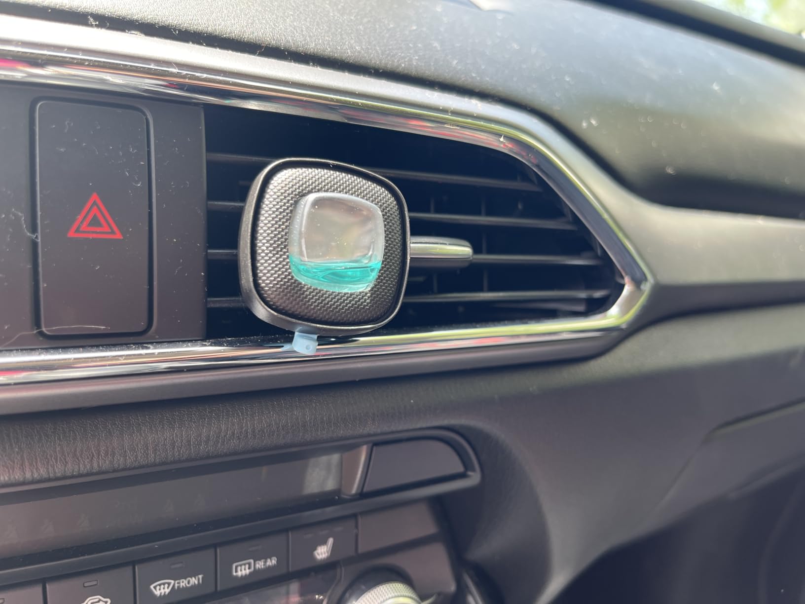 Febreze Car Air Freshener, Odor-Fighting Automotive Vent Clip, Scented Car Accessories, Long Lasting for Strong Odors, Unstopables Fresh Scent, .07 fl oz, 4 Count customer photo 1