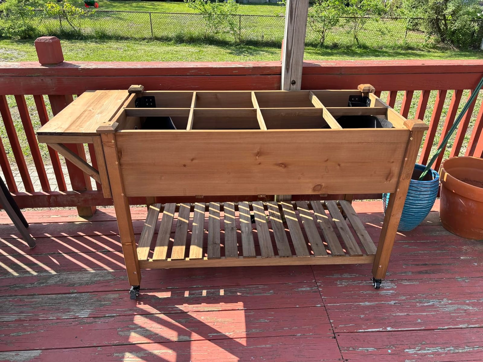 ketive Raised Garden Bed with Lockable Wheels Mobile Elevated Wood Planter,Storage Shelf, Protective Liner,55.5x24x32in (Brown) customer photo 1