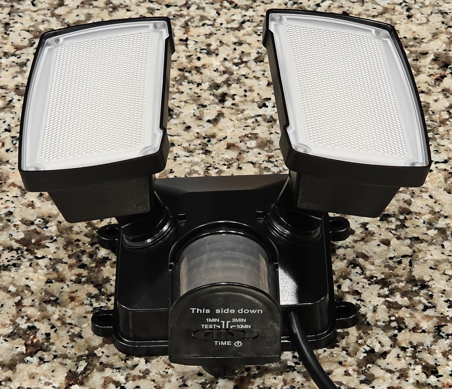 LUTEC 21W Plug in Motion Sensor Light Outdoor, Flood Lights Outdoor Motion Sensor, 2500LM, 5000K Daylight, IP65 Waterproof, Adjustable 2 Heads Wall Light for Garage, Porch, Yard - Black customer photo 1