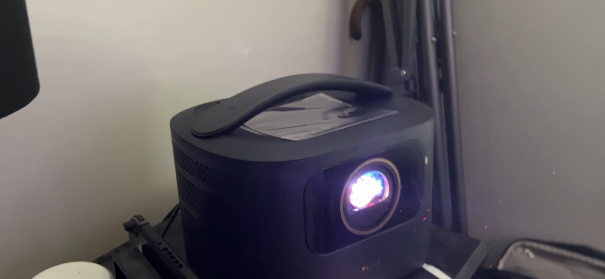 NexiGo TriVision Ultra, 4K Tri-LED-Laser Portable Projector, 2600 Lumens, 100,000:1 Dynamic Contrast, No Laser Speckle, No Eye Strain, Dolby Vision, HDR10+, 3D, Fire TV Storage Slot customer photo 1