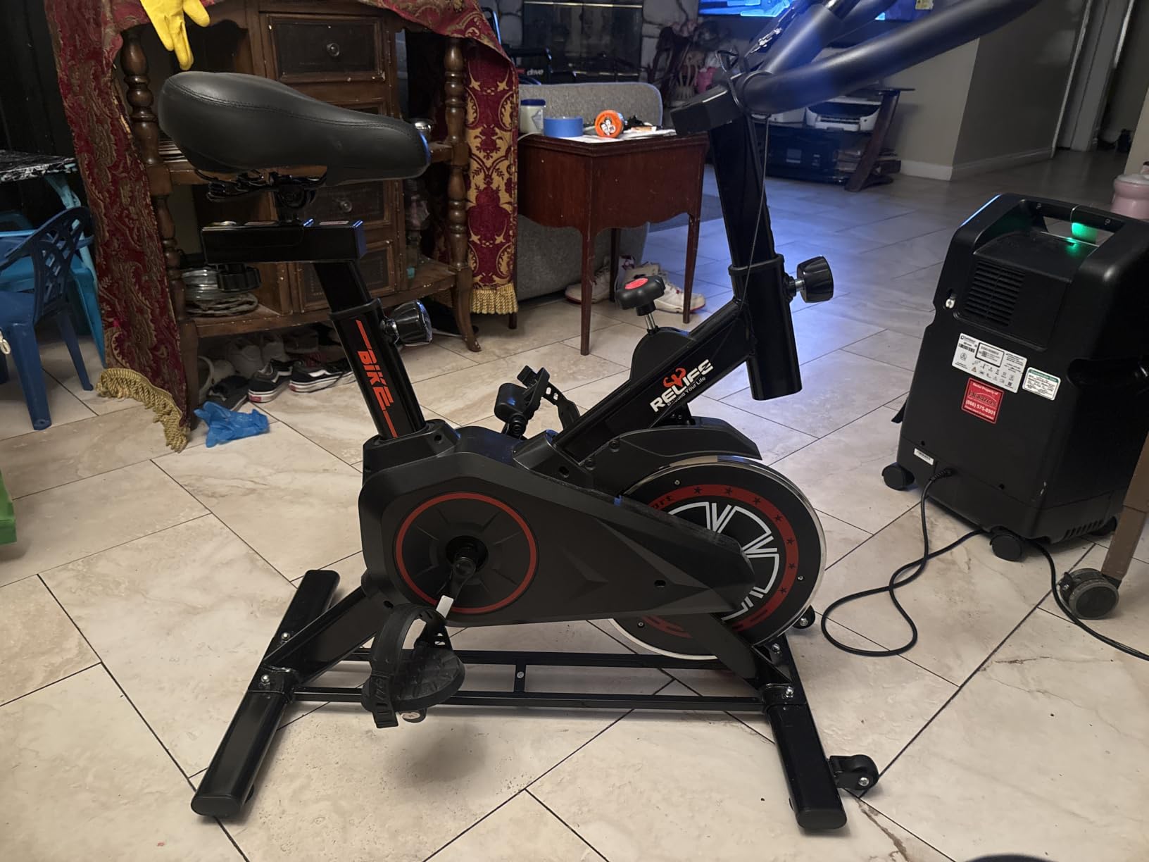 RELIFE REBUILD YOUR LIFE Exercise Bike, Friction Stationary Bike for Home | Low Noise Belt Drive Indoor Cycling, Adjustable Brake Pad Resistance, 300lbs Weight Capacity & Tablet Mount for Weight Loss customer photo 2