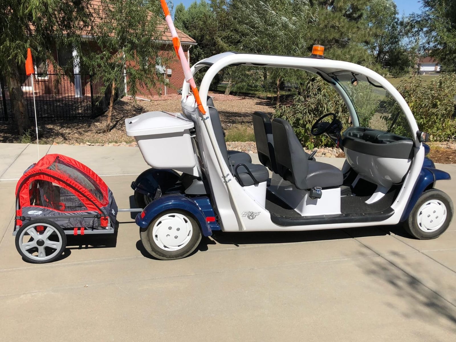 Instep Take 2 Double Seat Bike Child Trailer, Max Weight 80 lbs., 5-Point Harness, Folding Frame, Quick Release Wheels, Bug Screen & Weather Shield, Red customer photo 1