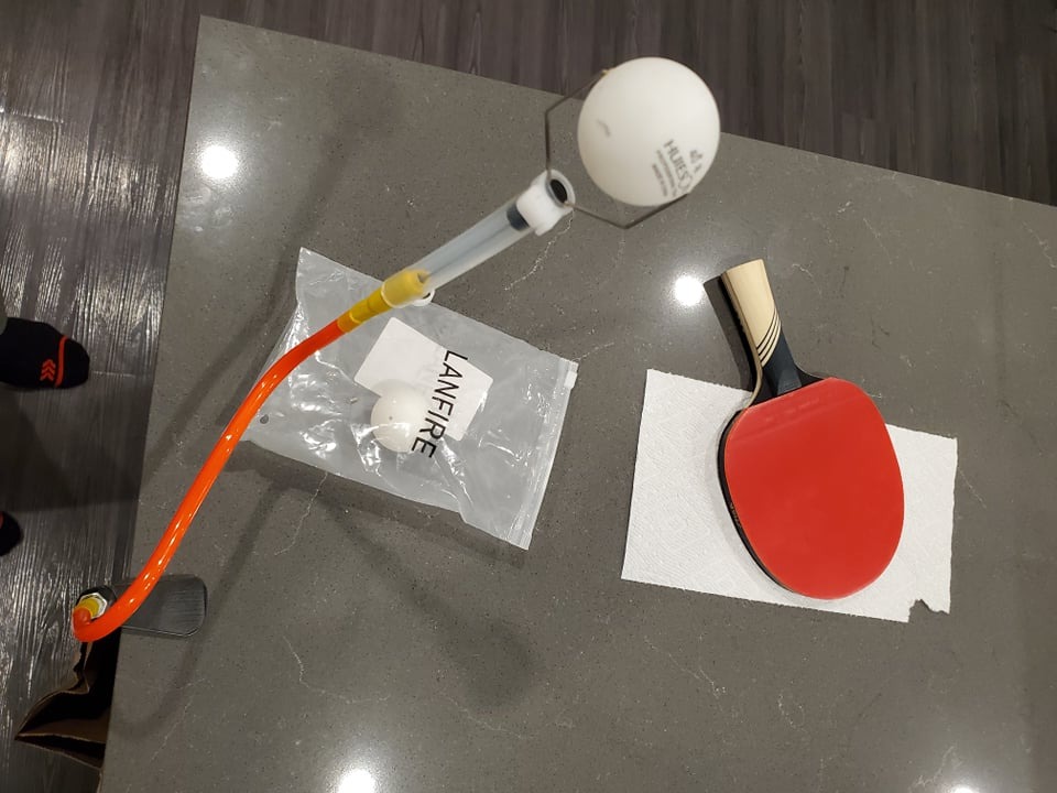 Professional Table Tennis Training Robot Fixed Rapid Rebound Ping Pong Ball Machine Table Tennis Trainer for Stroking customer photo 1